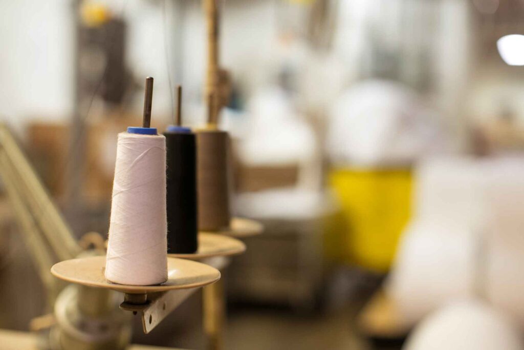 Threading the web for knit fabrication